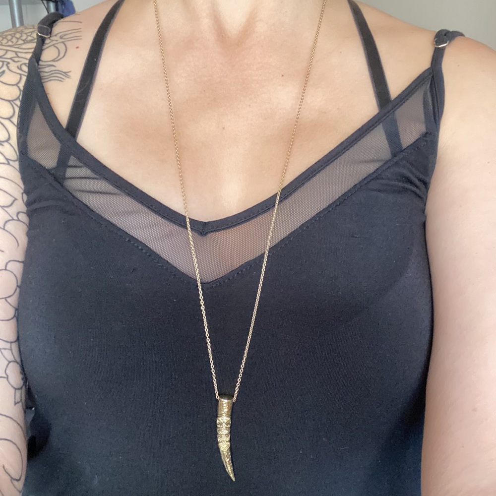 Double sided CZ gold tone horn necklace